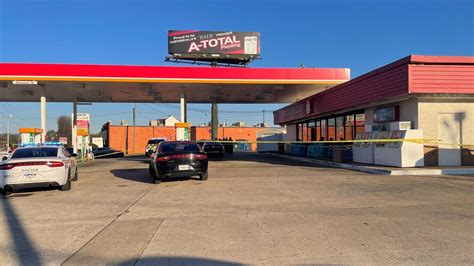 cartersville news|Officer shoots armed suspect during chase at Cartersville gas station.
